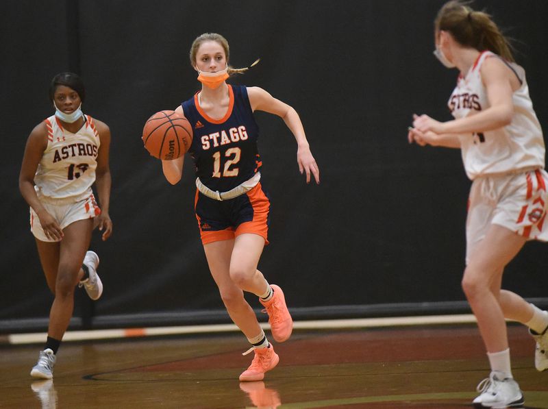 Stagg's Gail Korbitz (12) brings the ball up the court against Shepard during a game in Palos Heights on Monday, Nov. 29, 2021.